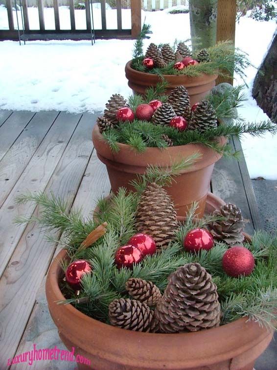 porch- potted pinecones